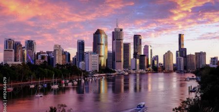 View of Brisbane city and Brisbane River early in the morning with pink clouds